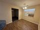 Dining room featuring light brown walls, wood flooring and natural light at 40 Brandon Dr, Covington, GA 30016