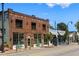 Commercial building featuring the Halfway Crooks brewery and other small businesses on a sunny day at 562 Formwalt Sw St # 5, Atlanta, GA 30312