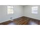 Bedroom with hardwood floors and two windows allowing lots of natural light at 1722 Detroit Nw Ave, Atlanta, GA 30314