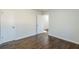 Comfortable bedroom offering hardwood floors, two closets, and neutral walls at 1722 Detroit Nw Ave, Atlanta, GA 30314