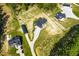 An aerial view highlights the property's expansive lot and the surrounding lush greenery and landscaping at 1291 Pleasant Grove Church Rd, Villa Rica, GA 30180