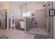 Modern bathroom features a glass-enclosed shower and a standalone soaking tub at 1291 Pleasant Grove Church Rd, Villa Rica, GA 30180