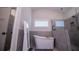 Modern bathroom features a glass-enclosed shower and a standalone soaking tub at 1291 Pleasant Grove Church Rd, Villa Rica, GA 30180