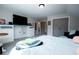 Neutral bedroom featuring carpet, large closet, and built-in shelves with storage at 1291 Pleasant Grove Church Rd, Villa Rica, GA 30180