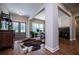Inviting foyer featuring hardwood floors, a large rug, and elegant furnishings at 1291 Pleasant Grove Church Rd, Villa Rica, GA 30180