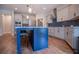 Modern kitchen with a large island, stainless steel appliances, and stylish backsplash at 1291 Pleasant Grove Church Rd, Villa Rica, GA 30180