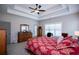 Comfortable bedroom features tray ceilings, ceiling fan, and a relaxing atmosphere at 1291 Pleasant Grove Church Rd, Villa Rica, GA 30180