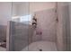 Modern bathroom features glass-enclosed shower, and light gray tile at 1291 Pleasant Grove Church Rd, Villa Rica, GA 30180