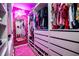Vibrant walk-in closet featuring well-organized storage and playful decor, ideal for fashion enthusiasts at 1291 Pleasant Grove Church Rd, Villa Rica, GA 30180