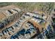 Aerial view of newly constructed homes featuring modern architecture and landscaping at 140 Kingsley Way, Acworth, GA 30102