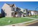 Row of new homes featuring green lawns and varied architectural styles at 140 Kingsley Way, Acworth, GA 30102