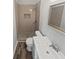 Updated bathroom featuring a tiled shower, modern vanity, and stylish fixtures at 332 Hickory Acres Se Dr, Smyrna, GA 30082