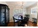 Bright breakfast nook with wood floors, pendant lighting, and a window for natural light while dining at 2087 Continental Ne Dr, Atlanta, GA 30345