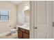 Bathroom featuring a modern vanity, sink, and window, accented by neutral tones at 4610 Roseman Trl, Cumming, GA 30040