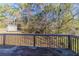 Cozy back deck with a wooded yard view at 5876 Old Wellborn Trce, Lithonia, GA 30058