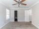 Neutral bedroom featuring an interior door and a closet at 5876 Old Wellborn Trce, Lithonia, GA 30058