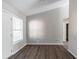 Dining room with wood flooring and a neutral wall color creating a cozy atmosphere at 5876 Old Wellborn Trce, Lithonia, GA 30058