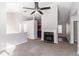 Spacious living room with fireplace and neutral carpet, perfect for entertaining at 5876 Old Wellborn Trce, Lithonia, GA 30058