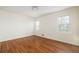 Spacious, light-filled bedroom boasts hardwood floors and ample room at 834 Heritage Sq, Decatur, GA 30033