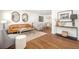 Spacious living room with hardwood floors and stylish decorations at 834 Heritage Sq, Decatur, GA 30033