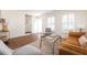 Inviting living room with hardwood floors, stylish decor, and ample natural light at 834 Heritage Sq, Decatur, GA 30033