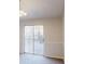 Carpeted dining room with sliding door to backyard deck, a great space for entertaining at 1198 Oak Knoll Ct, Lithonia, GA 30058