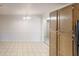 View of the kitchen cabinets with view to a bright dining area at 1198 Oak Knoll Ct, Lithonia, GA 30058