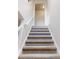 Carpeted stairs leading to upper level at 1198 Oak Knoll Ct, Lithonia, GA 30058