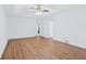 Large bedroom with hardwood floors, ceiling fan and neutral paint at 4156 Holly Springs Rd, Rockmart, GA 30153