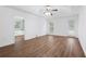 Spacious main bedroom with hardwood floors, ceiling fan and access to an outdoor patio at 4156 Holly Springs Rd, Rockmart, GA 30153