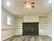 Living room with fireplace and built in bookshelves at 506 Sheppard Rd, Stone Mountain, GA 30083