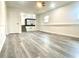 Bright living room featuring hardwood floors and a ceiling fan at 506 Sheppard Rd, Stone Mountain, GA 30083