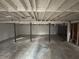 Spacious unfinished basement with visible beams, open layout offering potential for customization and additional living space at 3900 Boulder Park Sw Dr, Atlanta, GA 30331