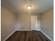 Neutral bedroom with hard surface flooring and a window at 3900 Boulder Park Sw Dr, Atlanta, GA 30331