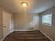 Bedroom with neutral paint, a window, and a closet at 3900 Boulder Park Sw Dr, Atlanta, GA 30331