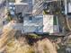 Aerial view of the house showing roof, driveway, patio, and landscaping at 2983 Crosswycke Forest Ne Dr # A, Atlanta, GA 30319