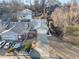 Aerial view of home with a long driveway and well-maintained landscaping and surrounding neighborhood at 2983 Crosswycke Forest Ne Dr # A, Atlanta, GA 30319