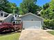 Charming home with a well-maintained lawn, complemented by a two-car garage and lovely landscaping at 2983 Crosswycke Forest Ne Dr # A, Atlanta, GA 30319