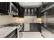 Modern kitchen with stainless steel appliances and dark cabinetry, ideal for culinary enthusiasts at 2983 Crosswycke Forest Ne Dr # A, Atlanta, GA 30319
