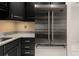 Close-up of a stainless steel Viking refrigerator in a well-appointed modern kitchen at 2983 Crosswycke Forest Ne Dr # A, Atlanta, GA 30319