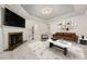 Modern living room with a marble fireplace, stylish decor, and elegant marble floors at 2983 Crosswycke Forest Ne Dr # A, Atlanta, GA 30319