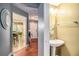 Half bathroom near the front door with a pedestal sink at 338 Saratoga Pl, Riverdale, GA 30296