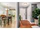 Welcoming entryway leading to a dining area, featuring hardwood and tile flooring at 338 Saratoga Pl, Riverdale, GA 30296