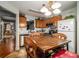 Eat-in kitchen featuring stainless steel appliances and ample cabinet space at 338 Saratoga Pl, Riverdale, GA 30296