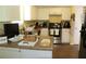 Functional kitchen with essential appliances and ample counter space for meal preparation at 5627 Isleworth Ct, Atlanta, GA 30349