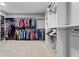 Large walk-in closet with custom shelves and hanging rods at 3669 High Green Dr, Marietta, GA 30068