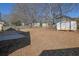 View of a spacious backyard featuring a shed at 983 Oakwood Chase Cir, Stone Mountain, GA 30083