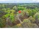 Secluded home nestled in a lush green forest, offering privacy and tranquility at 125 Bridget Dr, Hampton, GA 30228