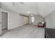 Spacious bedroom with neutral colors, sliding barn door, and bright overhead lighting at 2249 Chadds Creek Dr, Marietta, GA 30062