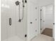 A bathroom with a shower and a walk in closet at 3785 Allegretto Cir # 230, Atlanta, GA 30339